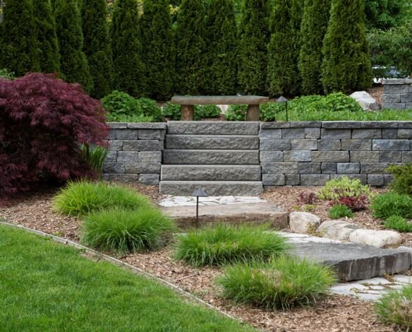 Custom retaining wall with lush landscaping